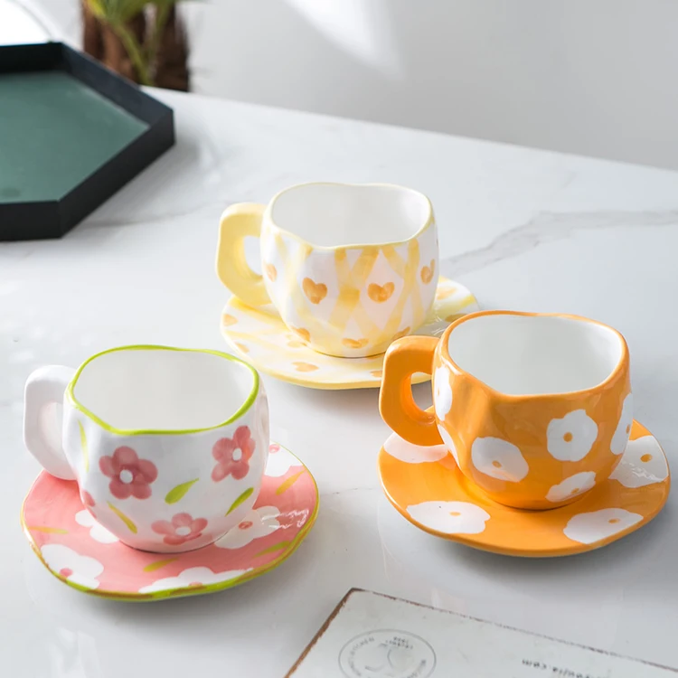 Modern nordic cute irregular flower design custom 200ml porcelain cup set ceramic pink expresso coffee cups with saucer