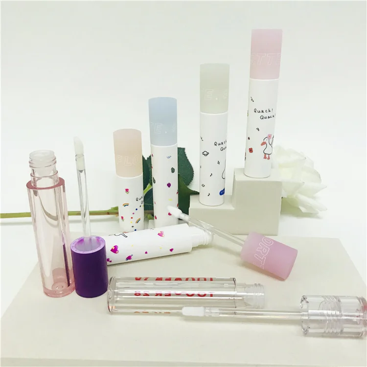
Custom different volume clear plastic lip gloss soft tube Round square lipstick tube container with unique head 