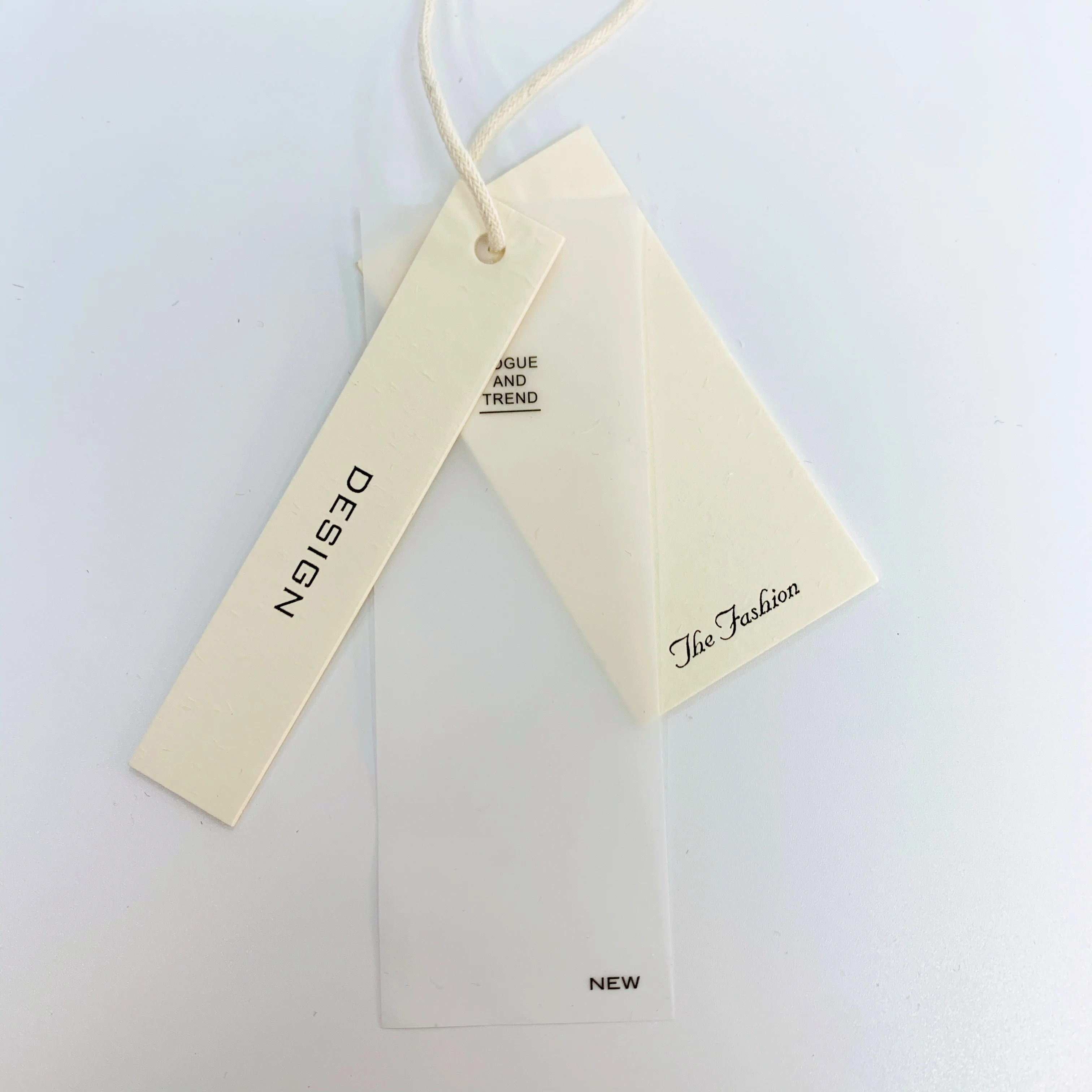 Custom clothing paper swing hanging tags lables translucent embossed pvc luxury printed logo garment hang tag with sting