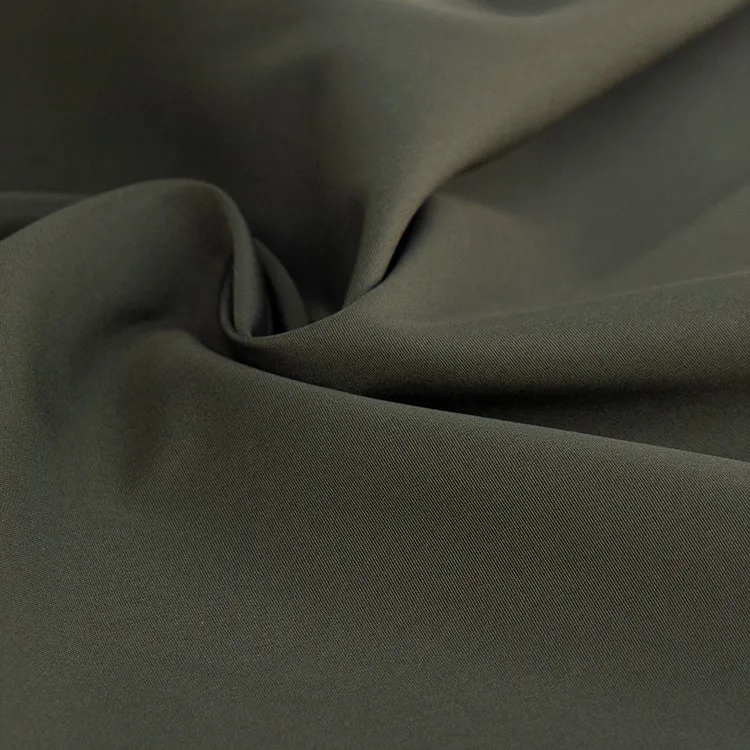 M755 recycled polyester twisted plain imitation memory fabric for wind coat