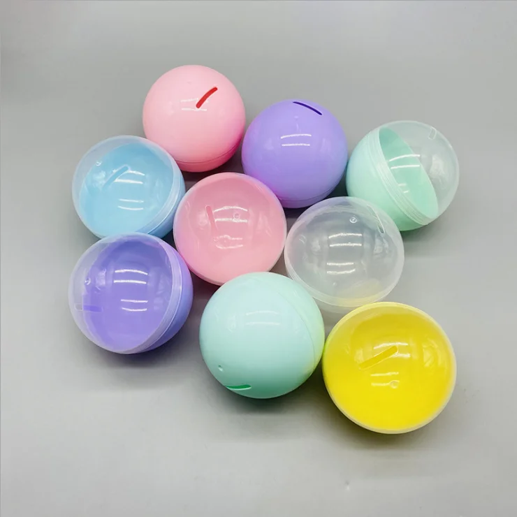 Jn2022 Wholesale 100mm Twisting Ball Bath Toys Custom Plastic Capsule Vending Empty Toy Capsules for Kids Suppliers