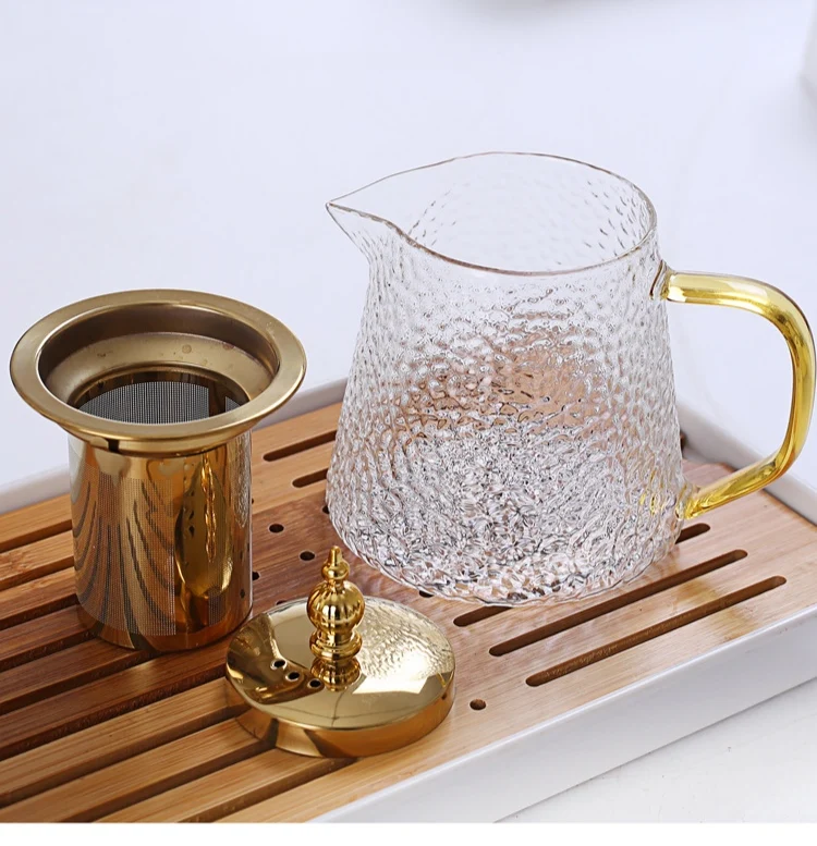 New Design Stove Top Safe 450ml 650ml 900ml Hammer Glass Teapot With Golden Color Stainless Steel Lid And Strainer