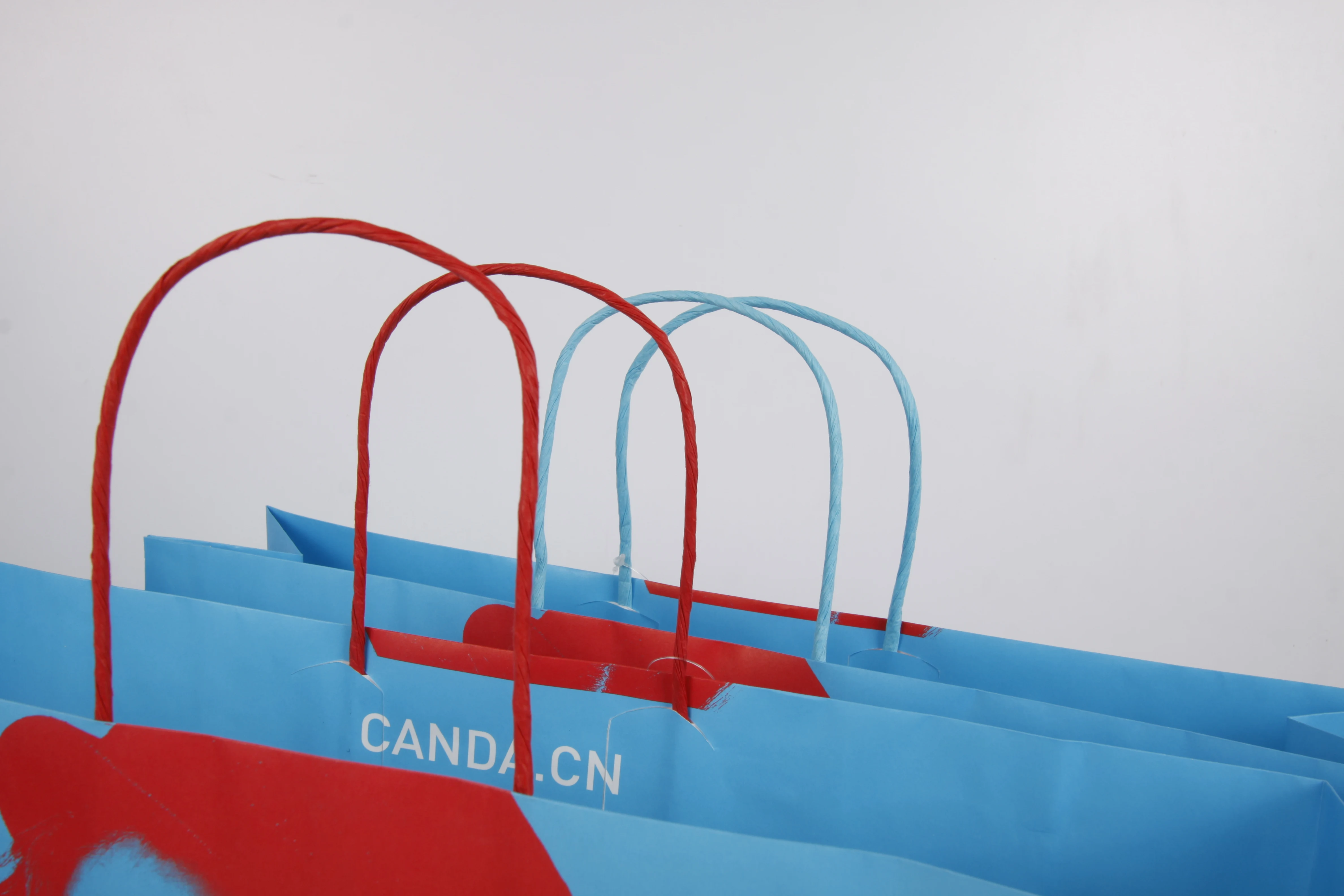 Promotional Paper Shopping Bags color Kraft Paper Carrier Bag price