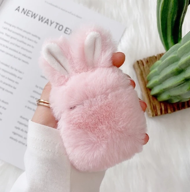Plush rabbit ears are protected by airpods pro2 headphones headphone case