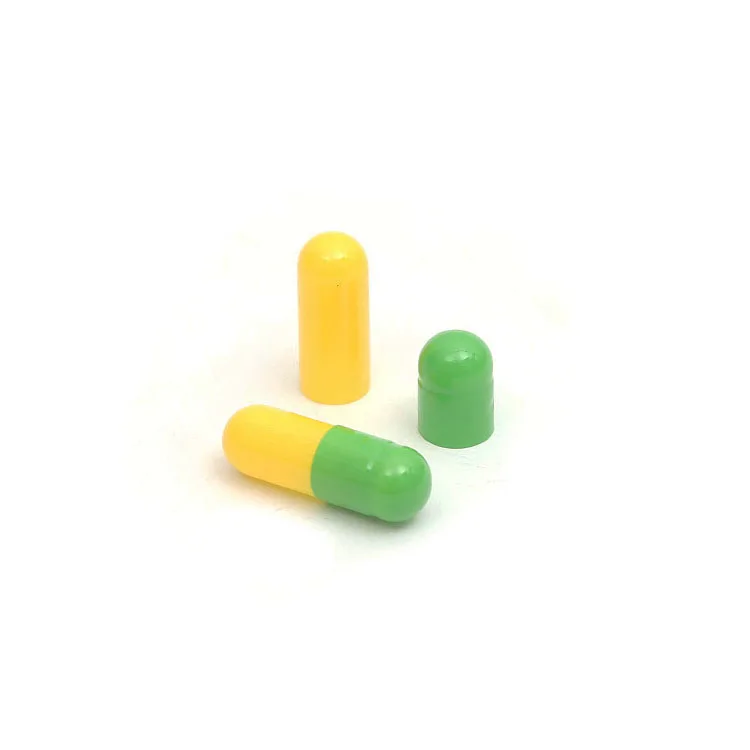 Separated size 1 empty gelatin capsules blue and white color