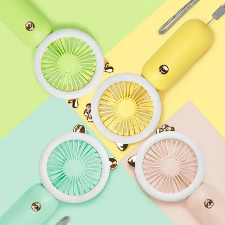 In stock Summer Small Pocket Cartoon Mini Fan Portable handheld Fan Cartoon Silent Night Light Mini Led Fan For Outdoor