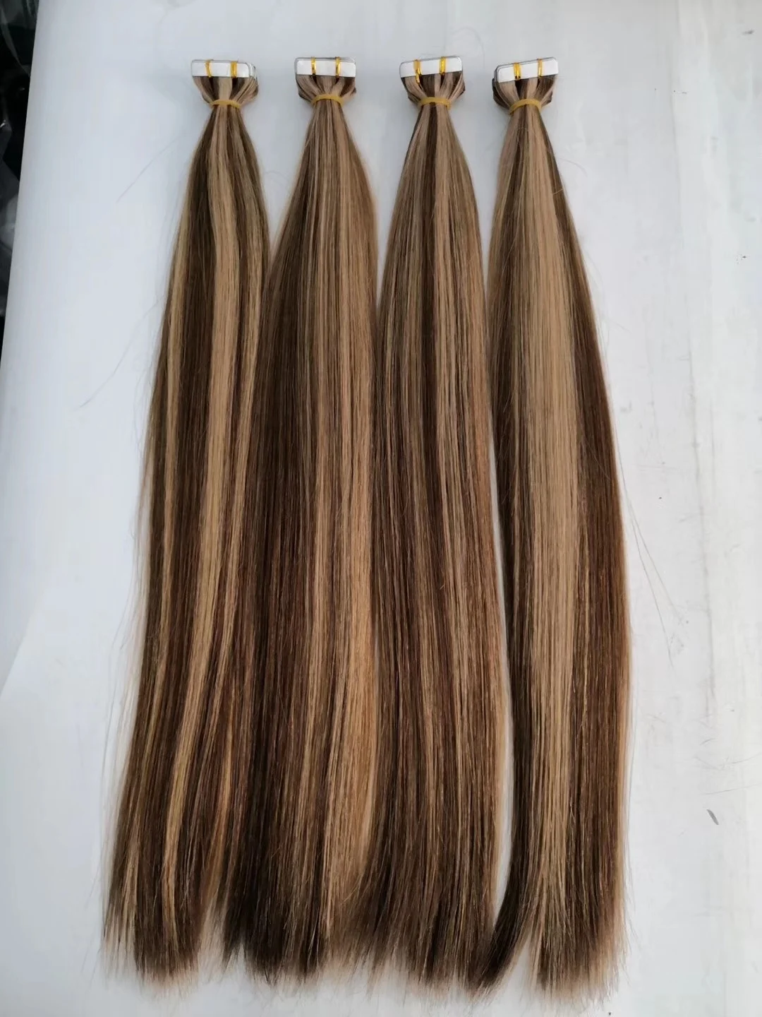 Best sale tape in hair extensions 100% human hair and raw indian temple hair in stock