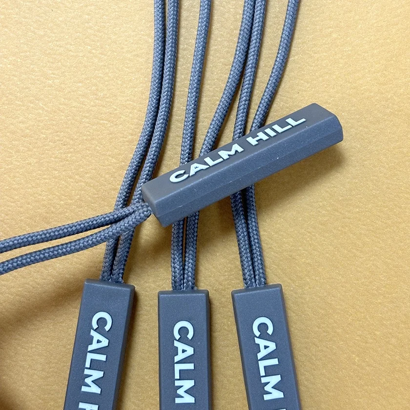 High Quality Custom Lengthening Rope PVC Zipper Puller with Embossed Logo New Eco-Friendly Plastic Zipper for Bags and Clothes