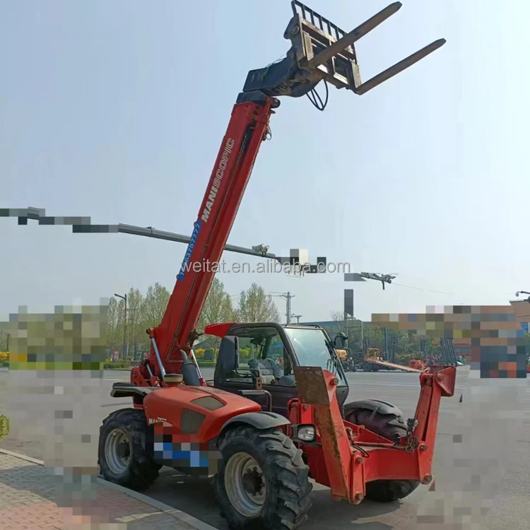 Used 2012 year Manitou MT-X1440SLT off road performance with telescopic arm multi-purpose fork truck