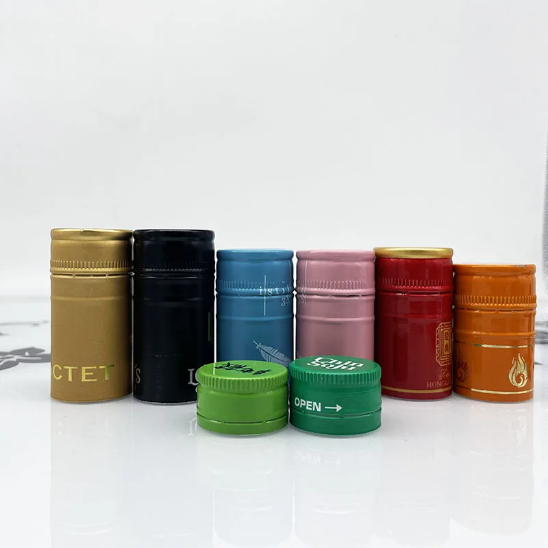 Hot sale Customized embossed logo 30X60 mm aluminum liquor whiskey rum gin glass bottle ROPP caps with saran tin saranex liner