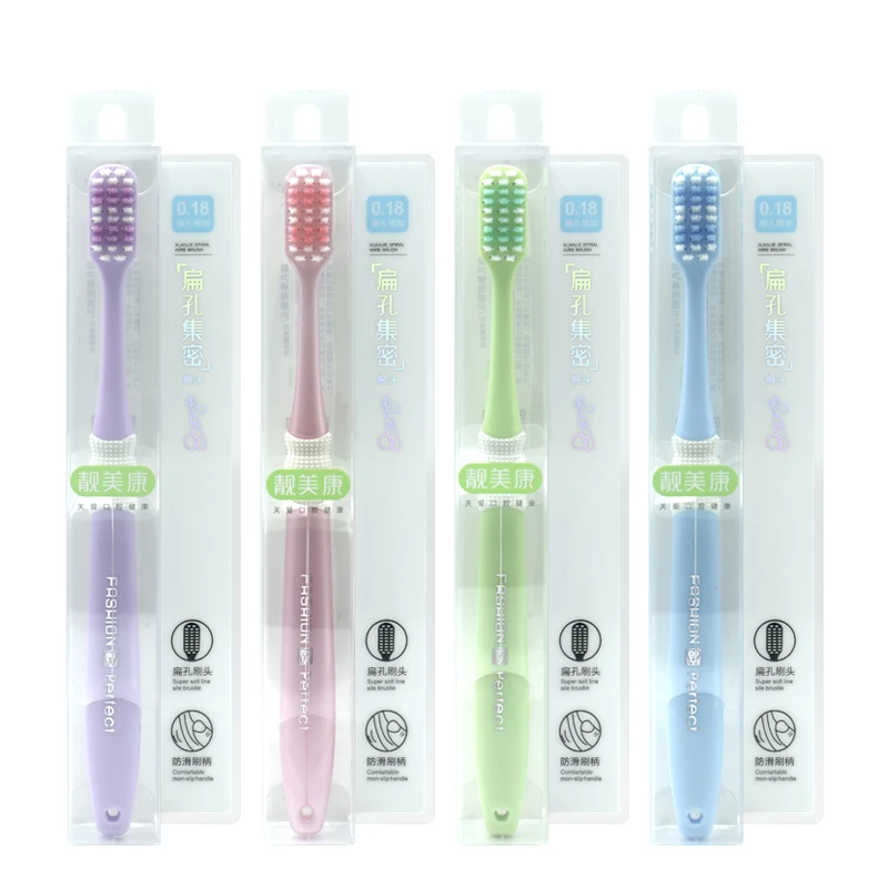 Factory wholesale custom logo shaped hole bristles plastic adult toothbrush