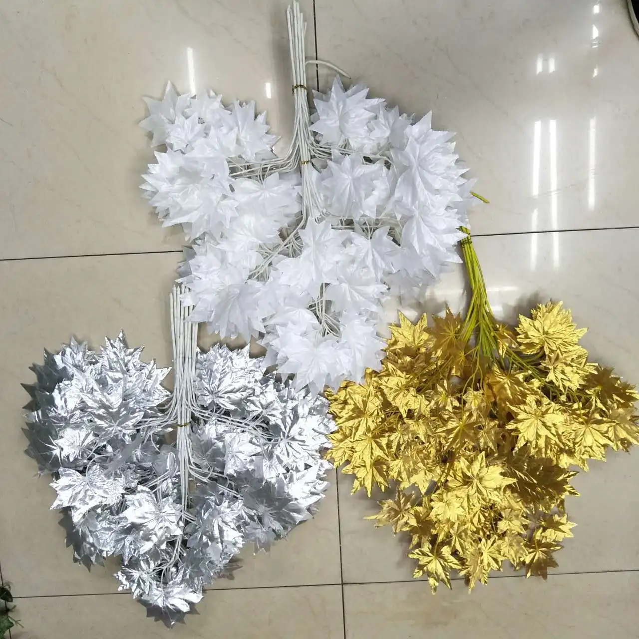 Silver artificial maple leaves for tree decoration