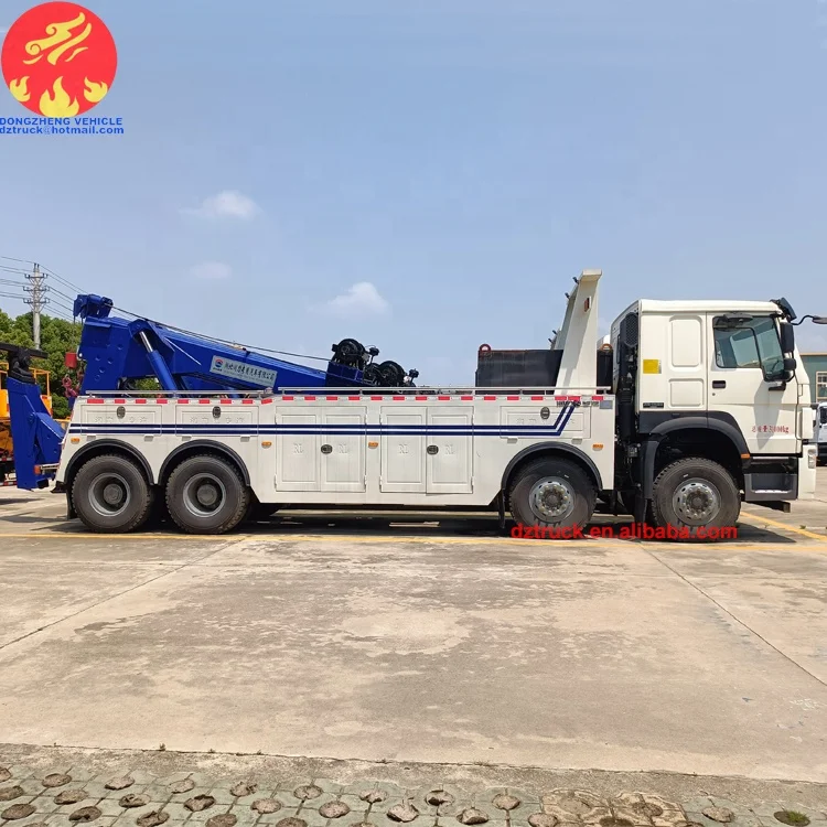 Sinotruck howo 8X4 30tons 50tons LHD heavy duty Dragging and lifting multifunction road wrecker rescue truck fow sale