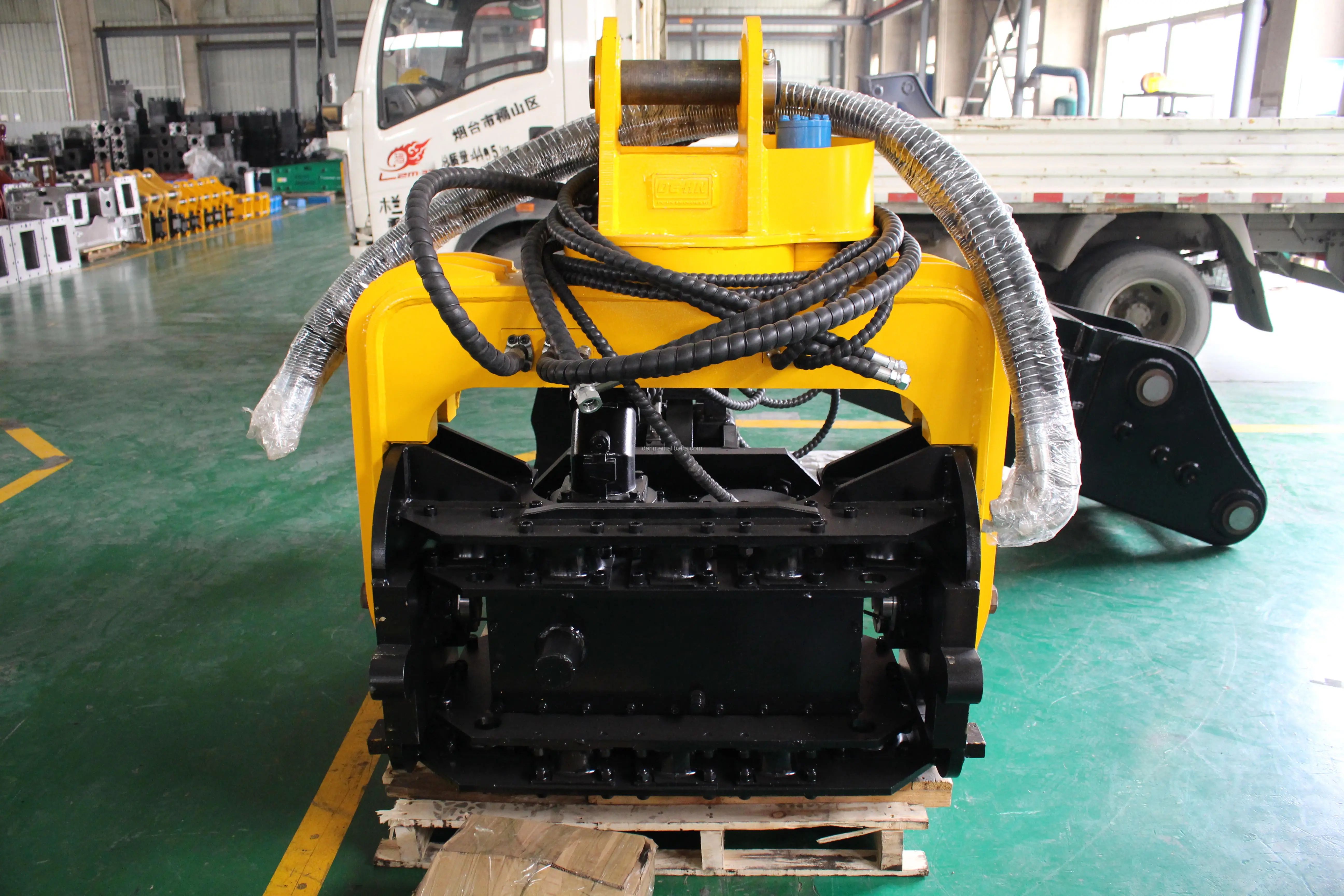 Mini excavator heavy duty vibratory hammer using pile driver hydraulics