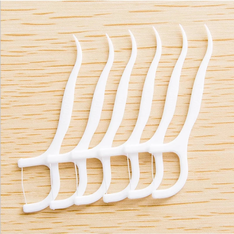 Dental floss Hot Sale 30PCS ultra-fine high tension fine sliding floss stick disposable polymer floss toothpick portable  ODM