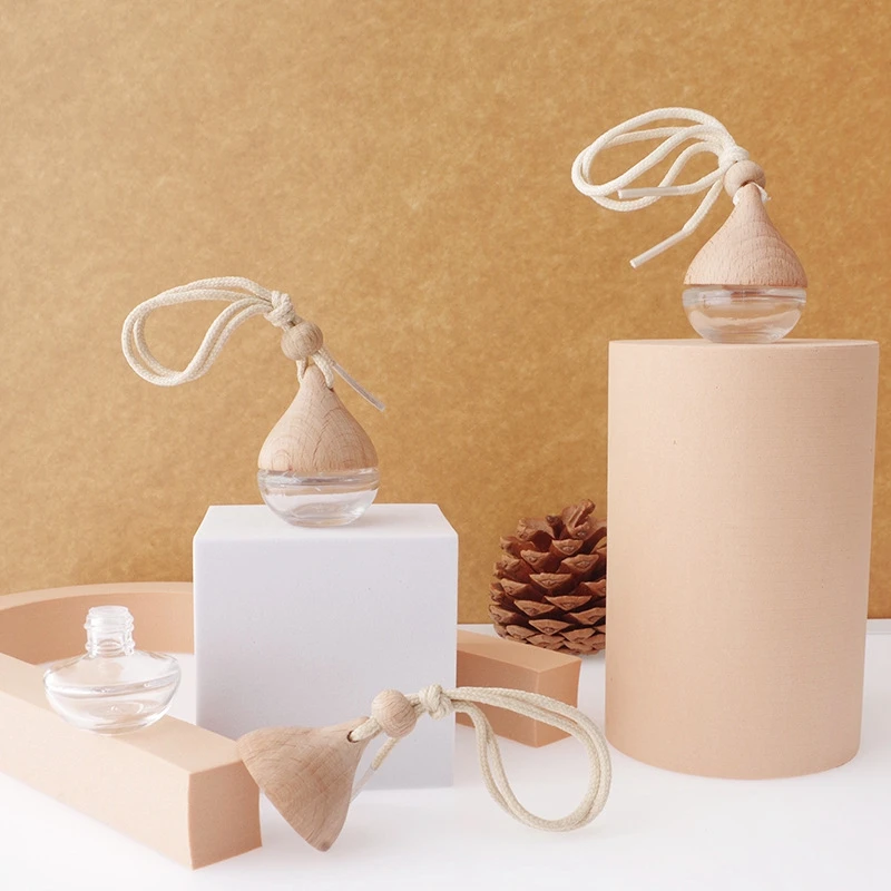 Fancy 7ml Empty Clear Glass Car Perfume Bottle Glass Hanging Diffuser Fragrance Bottle with Wooden Screw Cap