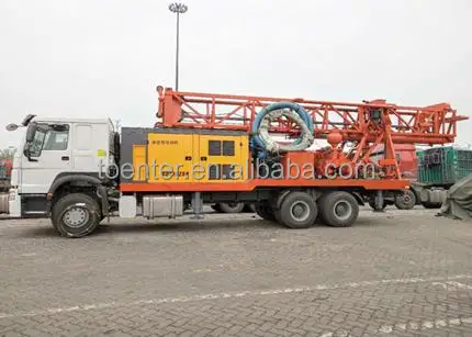 Vehicle-mounted large down-the-hole drilling rig and air compressor integrated car drill