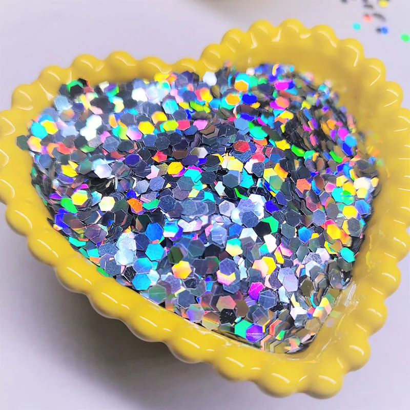 China produces cheap golden laser hexagonal sequins, happy atmosphere and colorful fragments