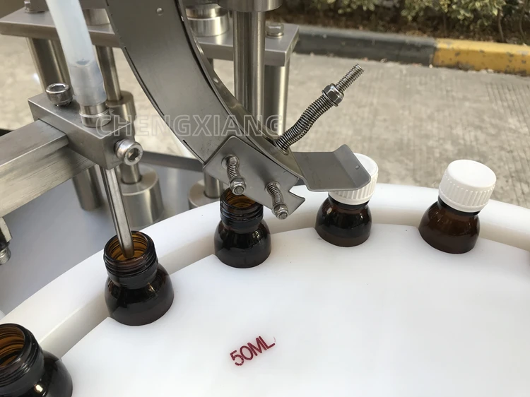 PLC control automatic 1oz 2oz 4oz shorts liquid energy drink syrup filling machine