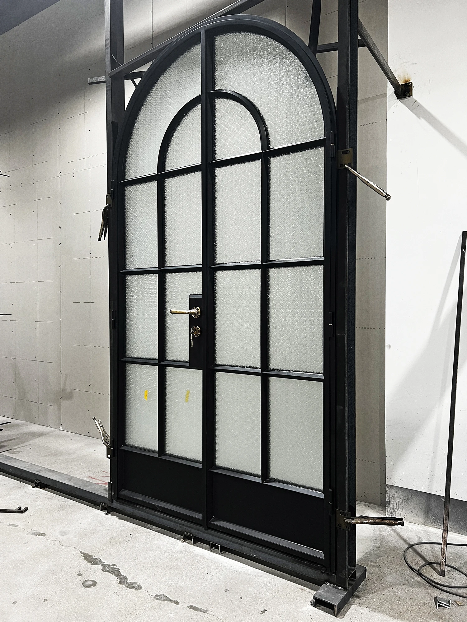 French interior doors Black arched swing double glass doors with opaque pattern laminated glass and vintage copper handles