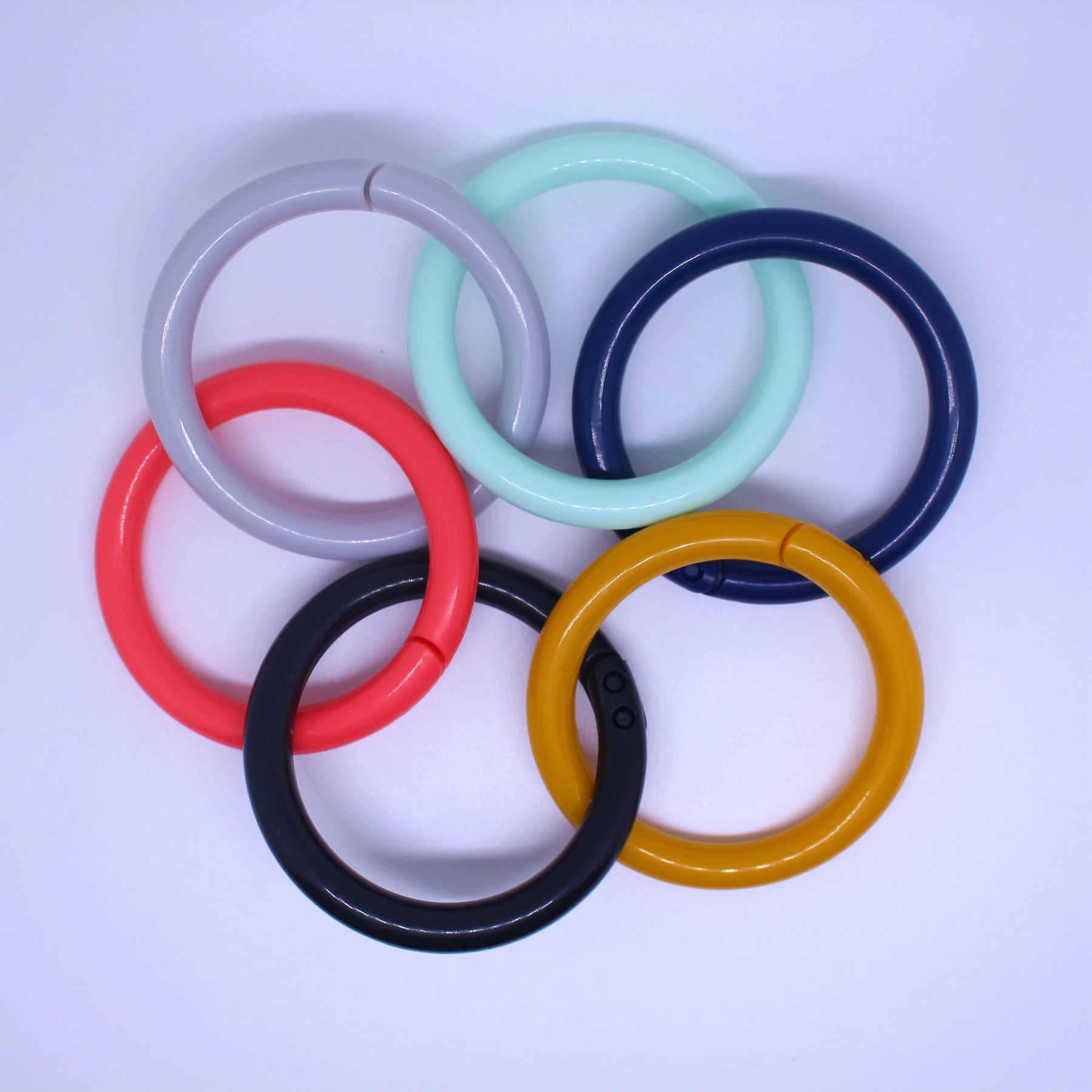 Wholesale kids plastic ring Circular open rubber ring Hanging baby toy custom LOGO plastic ring solid sizer