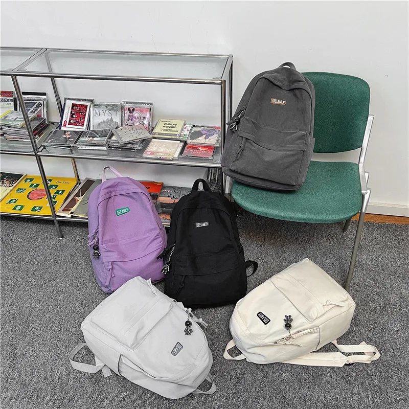 Simple solid color backpack for men and women Harajuku version of lovers campus outdoor