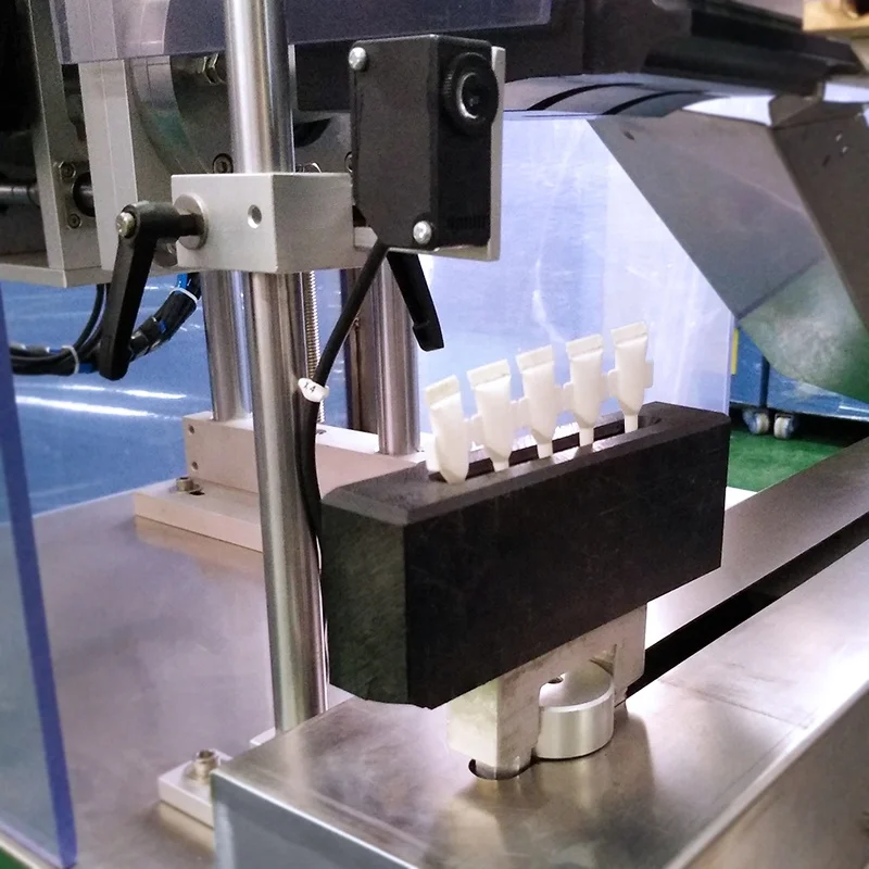 Horizontal type ultrasonic strip tube sealing welding machine