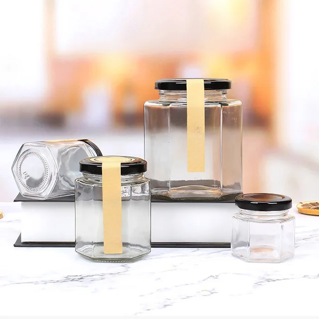 PUTIAN 45ml-730ml hexagonal glass jar hexagonal sauce and honey jar hexagonal jam transparent sealed jar with lid