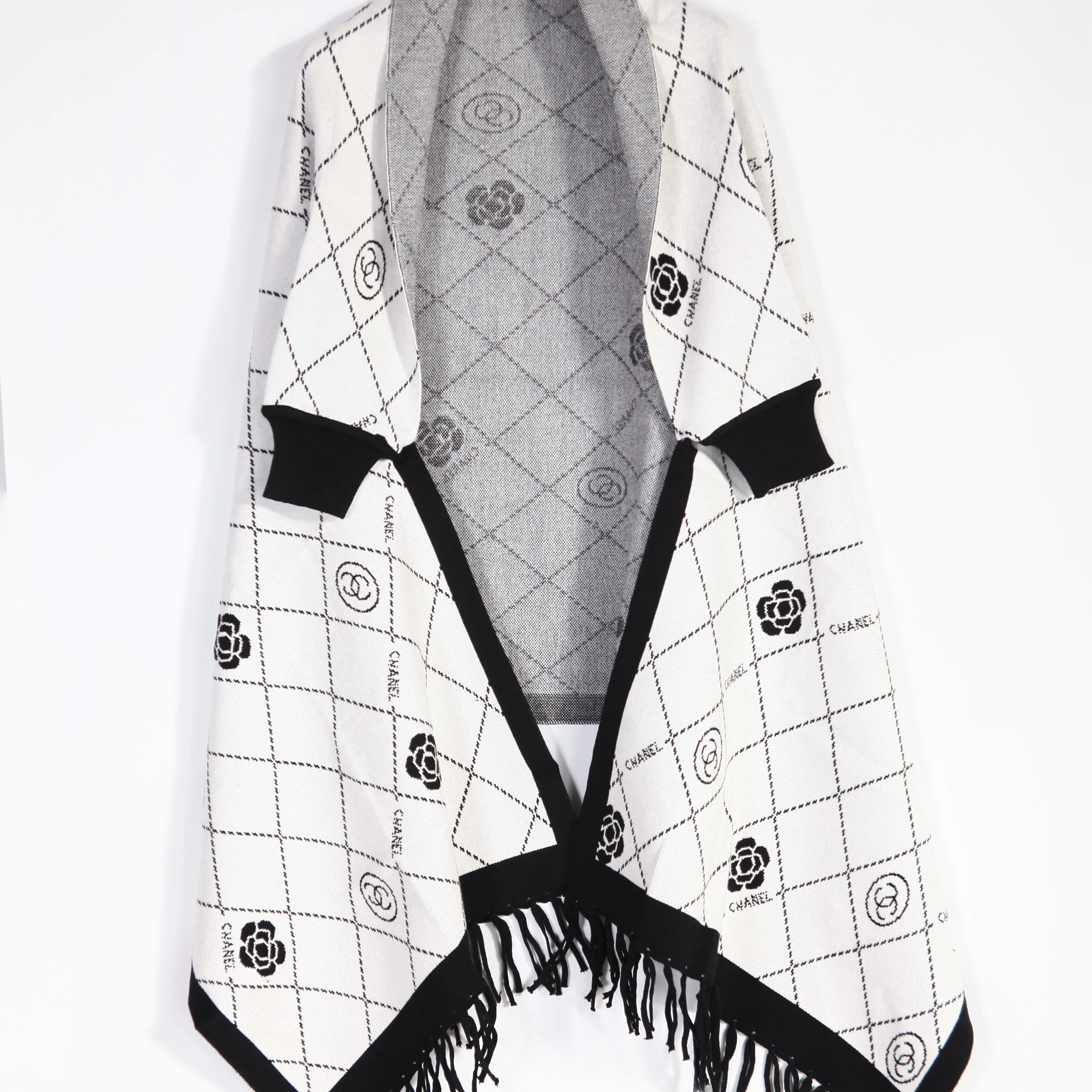 Wholesale Spring 2021 New Arrival Turn Down Neck Women Knitted Poncho Sweater Patterns Shawl Crochet Poncho For Women Sweater