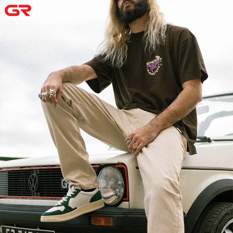 OEM High Quality Casual Loose Polyester Cotton Plain Round Neck Drop Shoulder T Shirts Custom Letter 3D Puff Print T Shirt