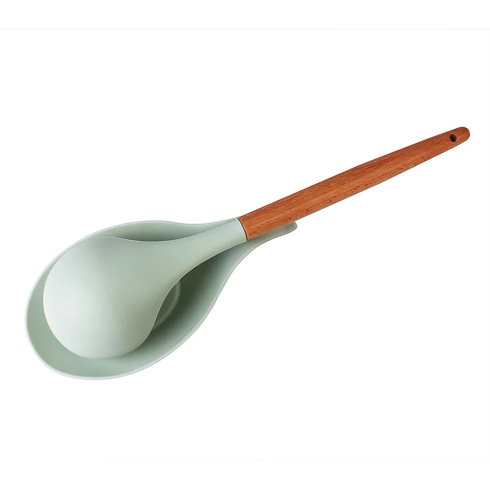 Wholesale Colorful Durable Heat Resistant Kitchen Utensils Holders Almond Shaped Mat Silicone spoon Rest
