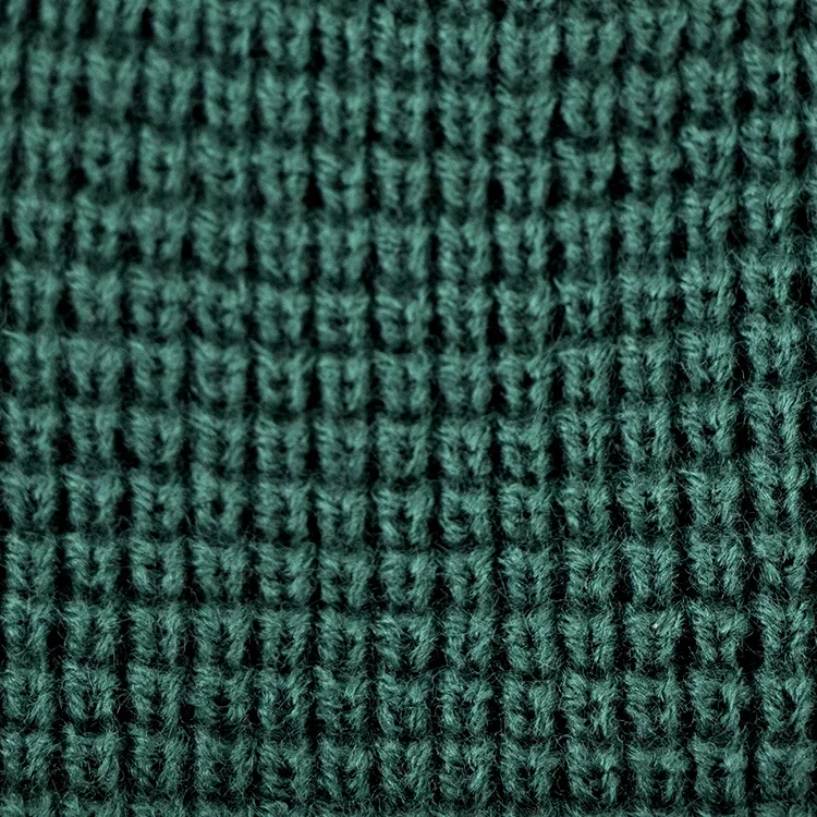 Hengxing solid green color custom pvc rubber patch skull cap soft cuffed winter warm hat waffle knit beanie manufacturer