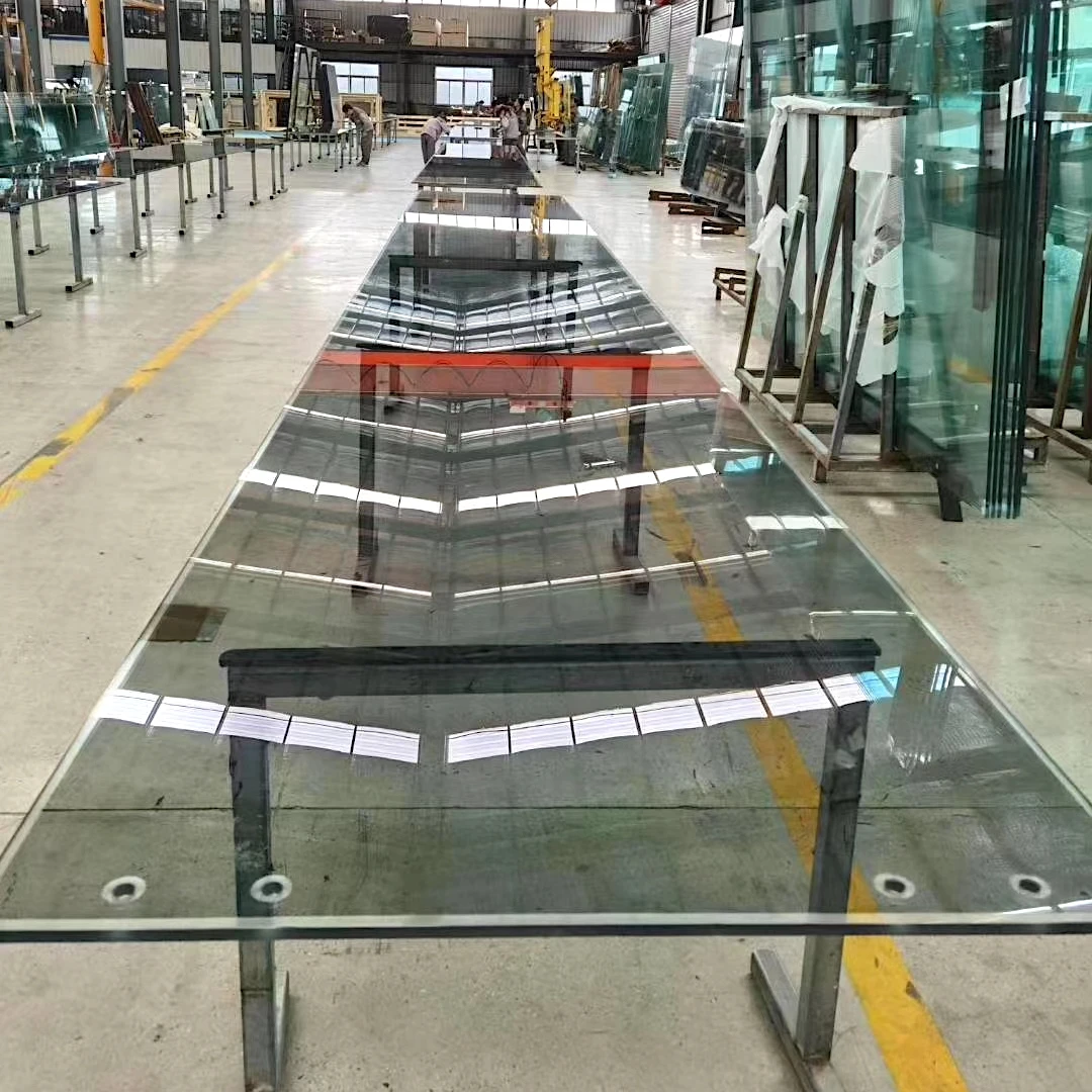 Longbo produces super white double silver hollow laminated curved steel glass with good camber and no stress spots