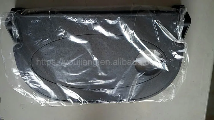 Folding plastic tray table for bus seat