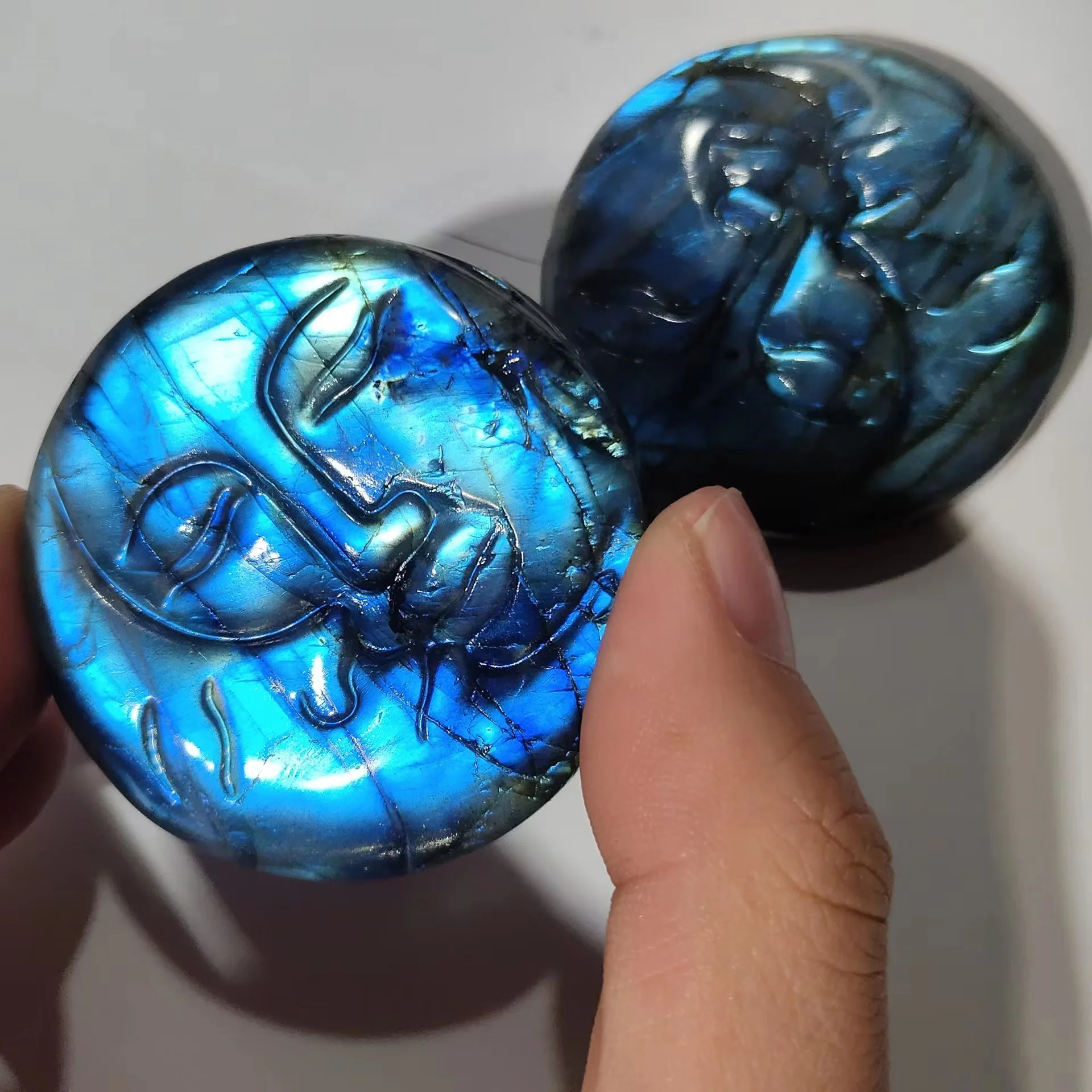 Wholesale Natural Strong Flash Blue Light Labradorite Crystal Carving Sun And Moon Palm