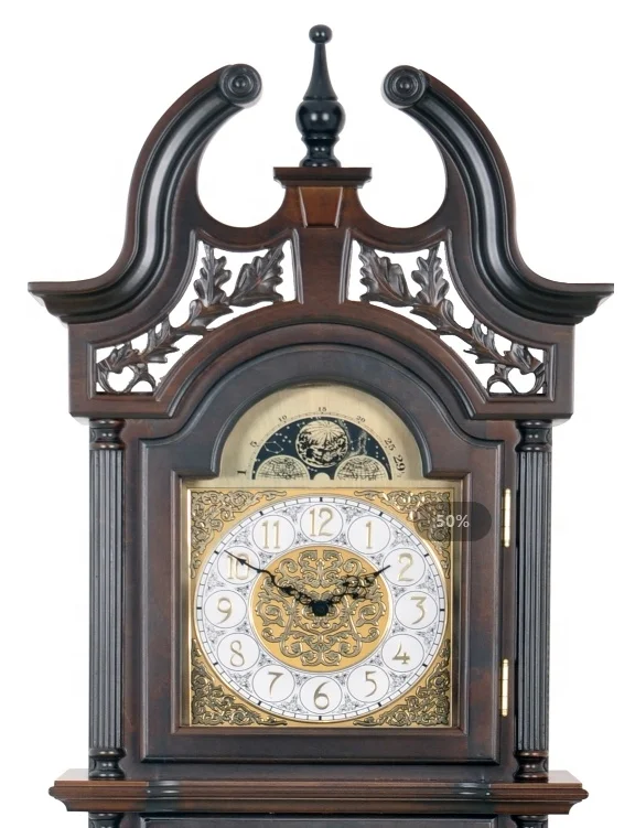 The graceful split pediment features a book-matched, olive ash burl overlay, a turned urn finial Wooden Floor Grandfather clock
