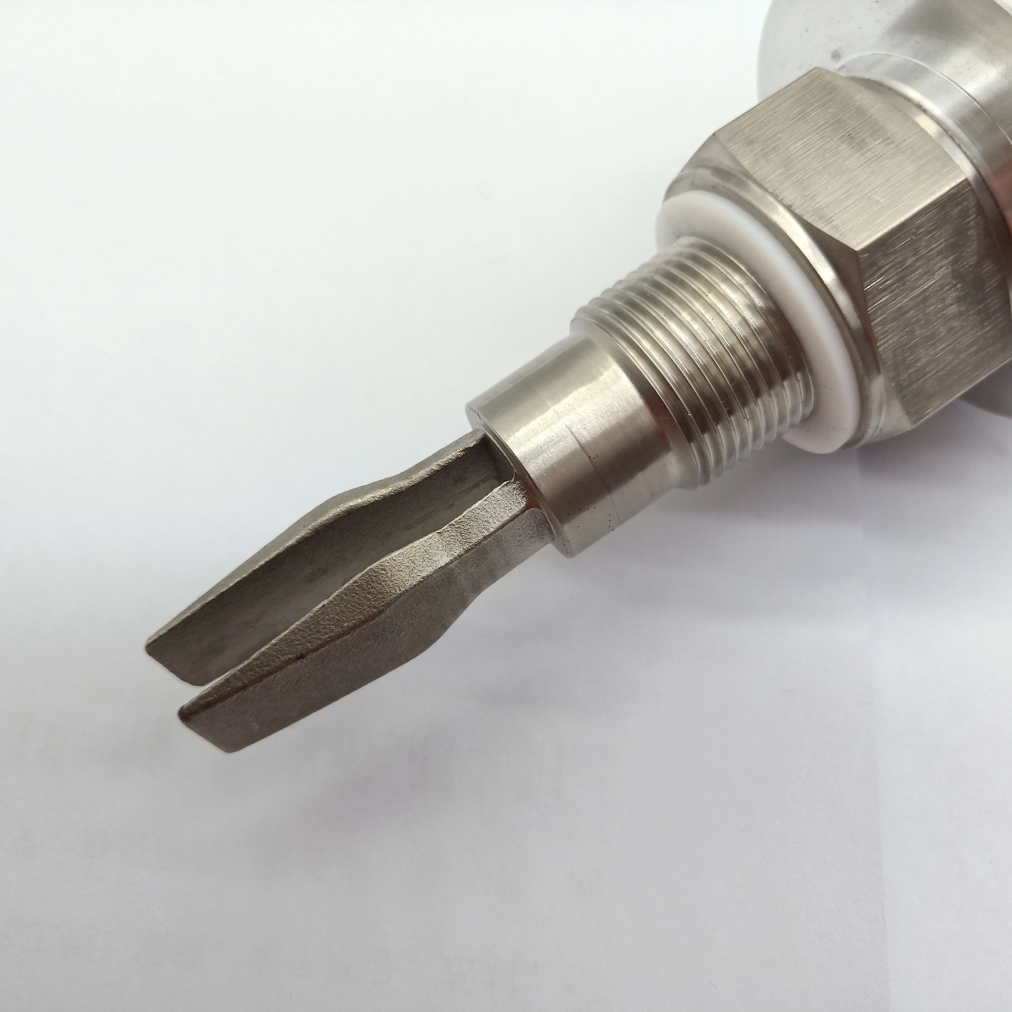 Tuning fork level switch for solid vibrating rod level switch