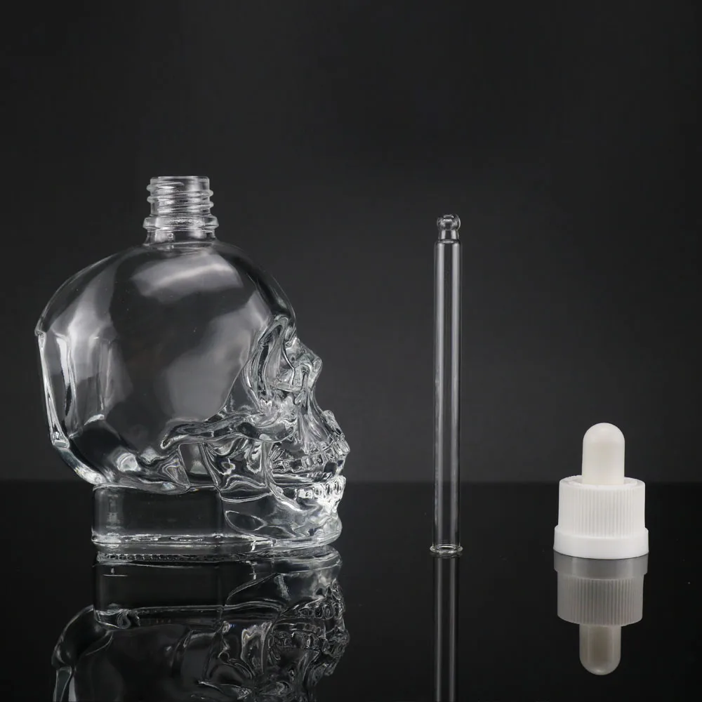 Unique Design Empty 15ml 30ml 100ml Skull Glass Perfume Diffuser Bottle With Spray Cap