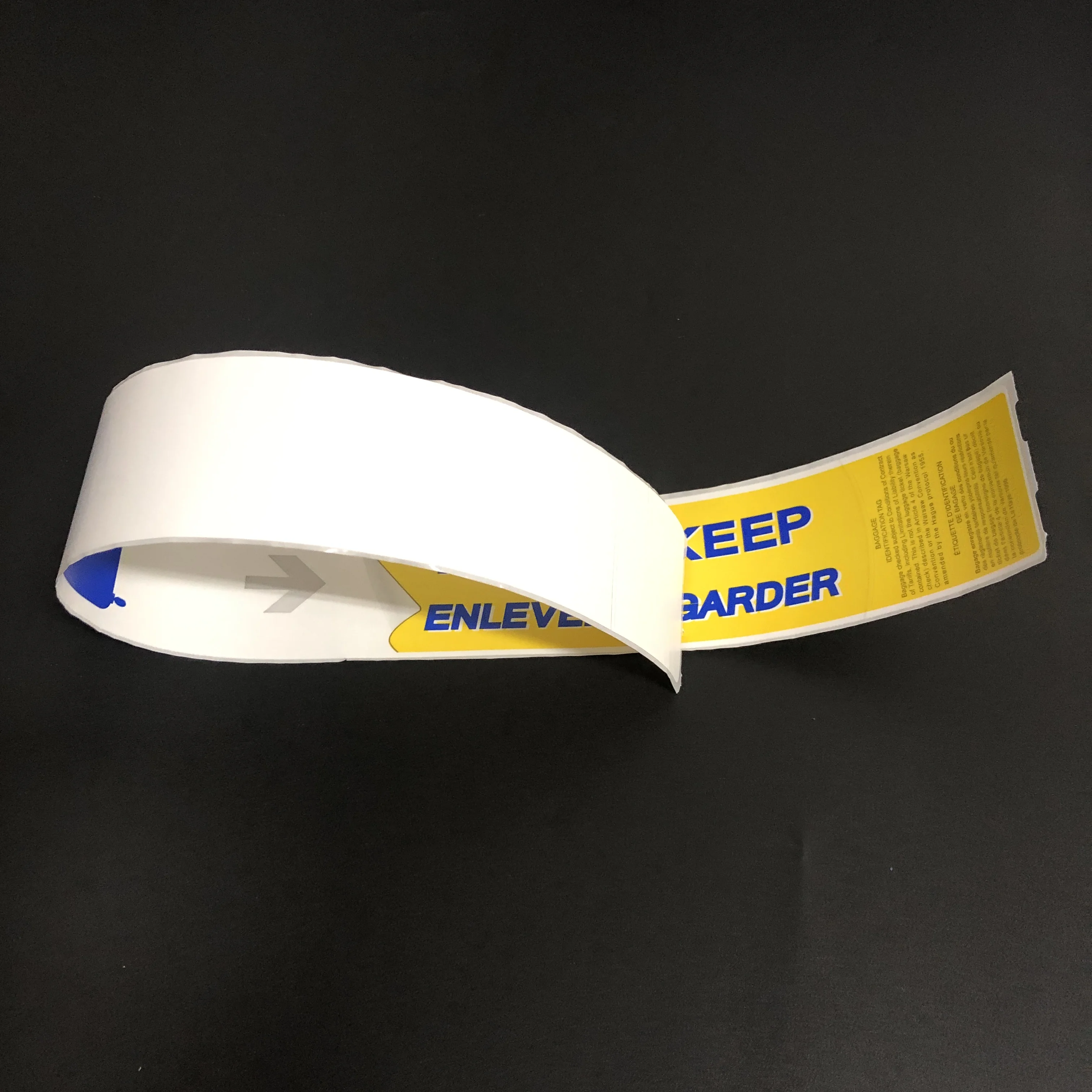 Customized cheap blank thermal adhesive luggage claim tags on roll taggage cliam sticker tags