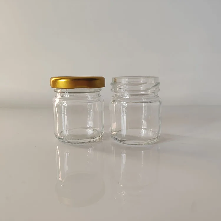Cheap Promotion 50ml 75ml Clear Glass Sauce Canned Honey Pickles Jam Jars Packaging with Gold Lid