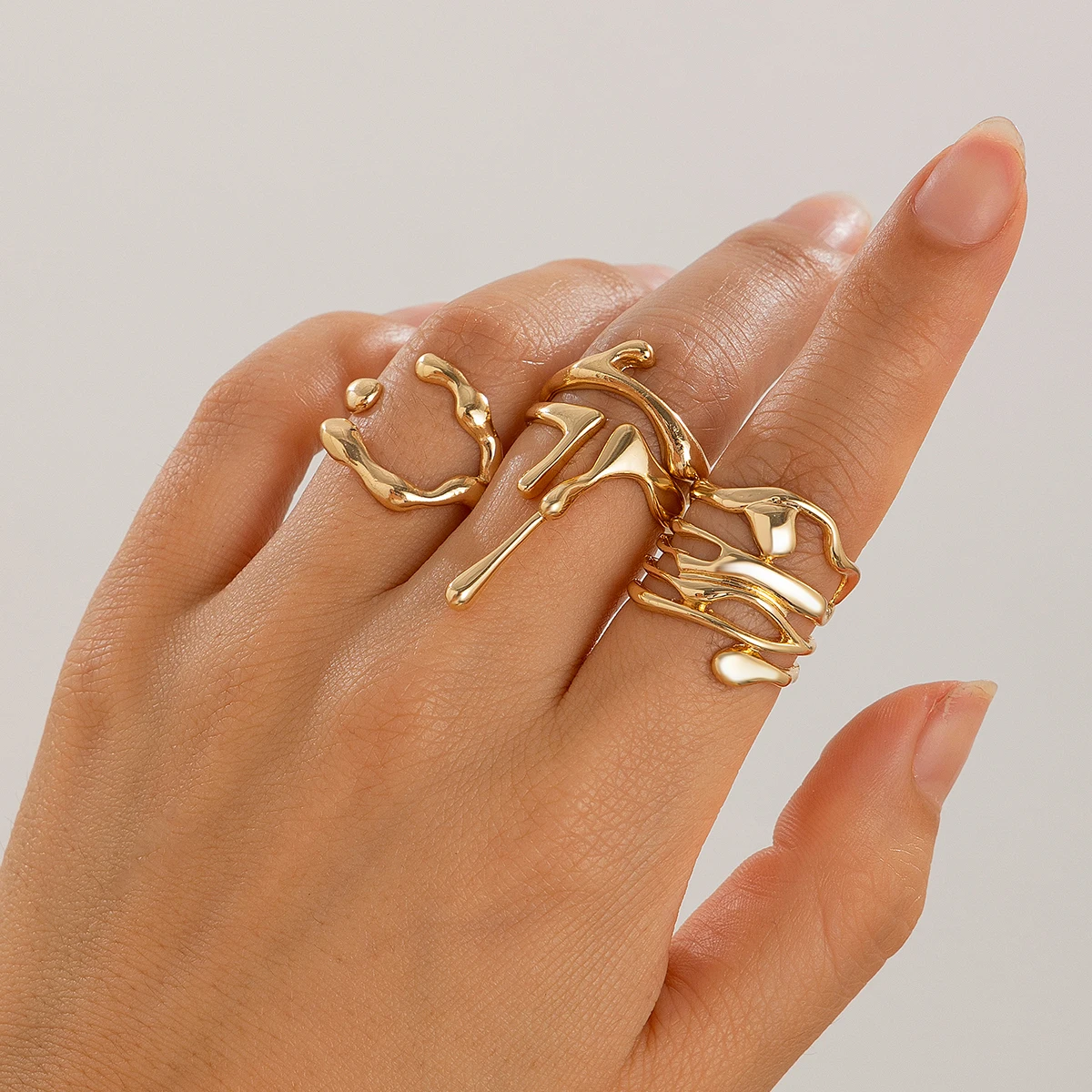 4 Pieces Irregular Designer Liquid Metal Rings Sets for Women Trendy Stackable Finger Rings on Hand Accessories Fashion Jewelry