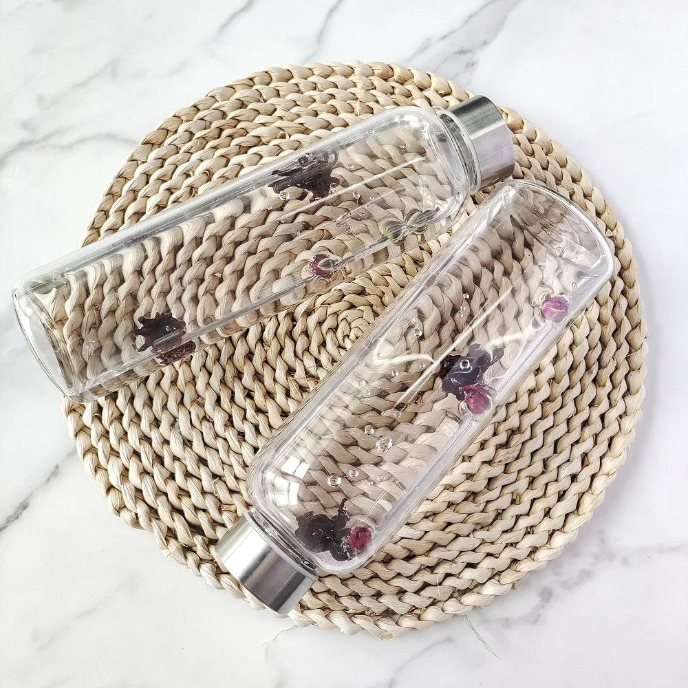 High Borosilicate Custom Logo Clear Glass drinking Bottle Luxury Style Smooth Glass Water Bottle With Sealing lid