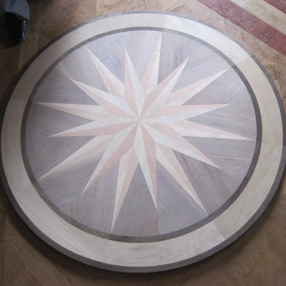 Hardwood floor medallions inlays for new and existing floors patterned design