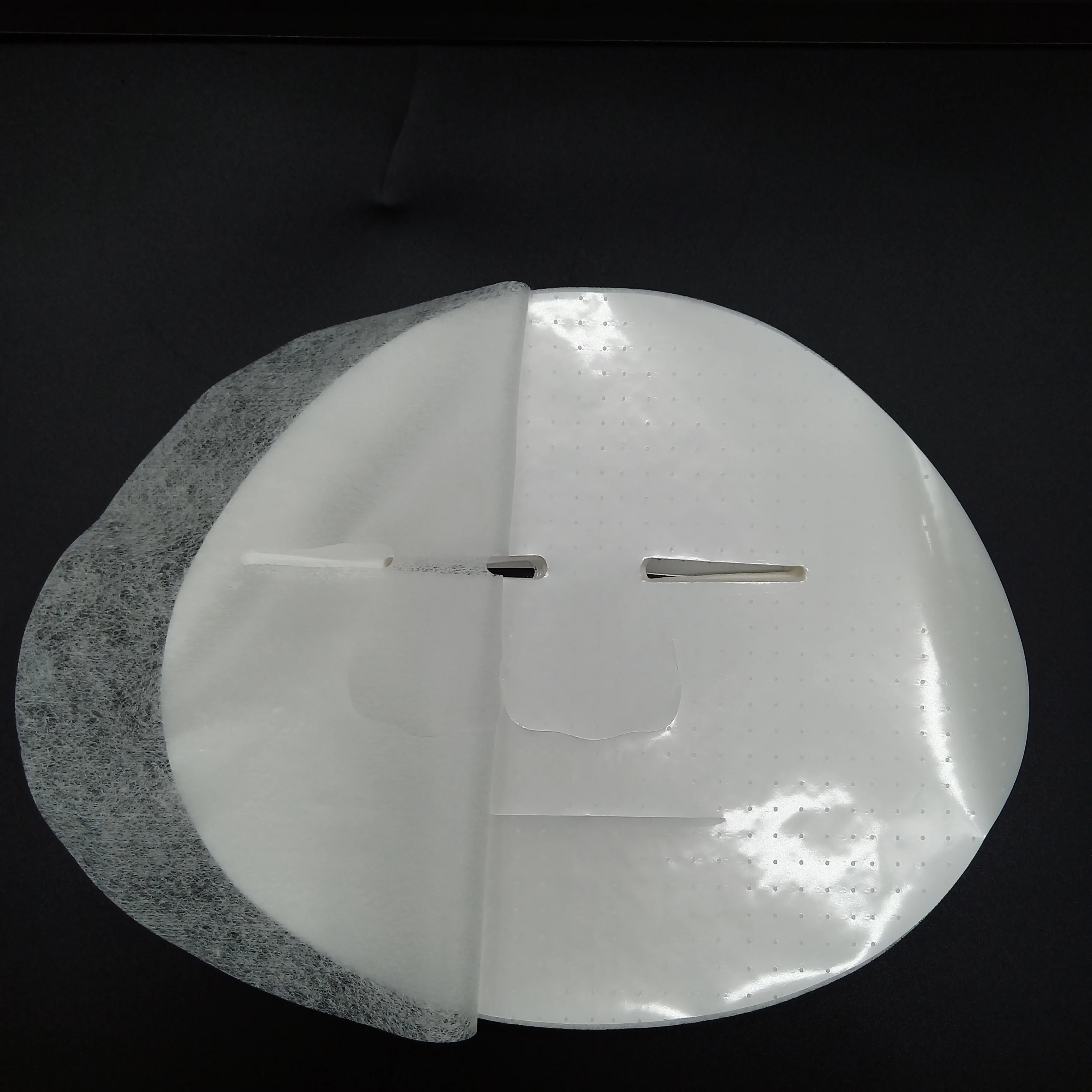 OEM  Invisible  Die-Cut 23gsm White Lyocell Viscose Spunlace Nonwoven Beauty Care Dry  Facial Mask Sheet