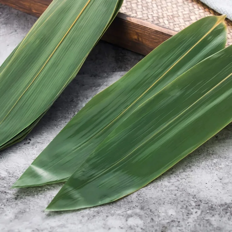 Cheap Biodegradable Bulk Natural Bamboo Leaf Panda Fresh Green Leaves Products for Sushi Leaves Boat Party Decoration