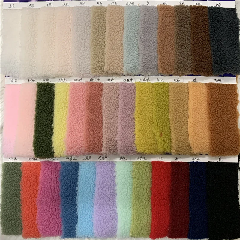 Free sample Hot sale 100% polyester red check jacquard wool rainbow color flannel fleece wholesale fabrics