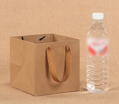 
Custom Cheap Jewelry Packaging Small Brown Kraft Shopping Paper Bag With With Ribbon Handles 