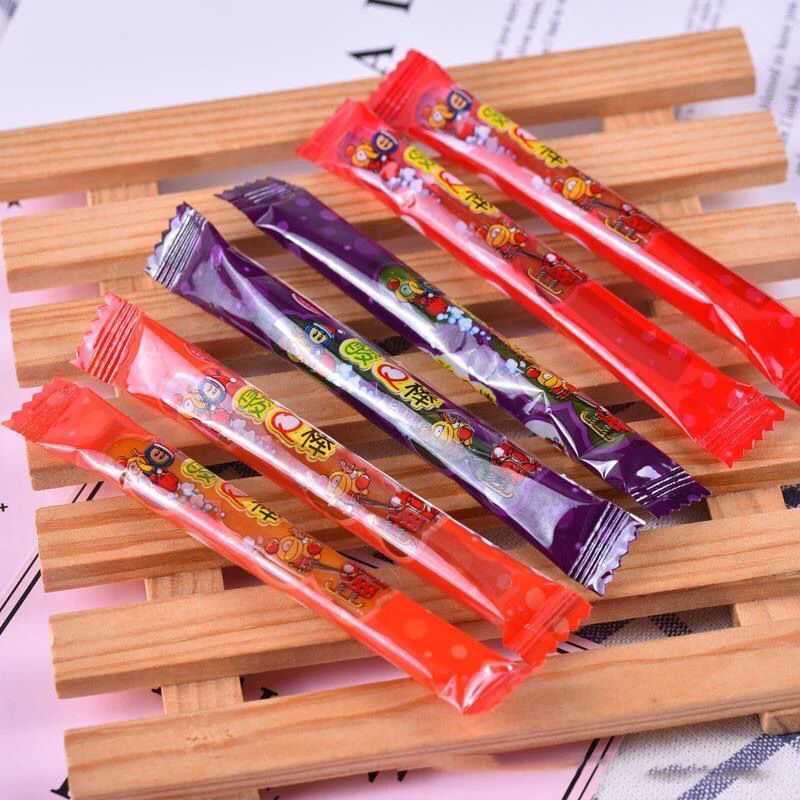 sticky gummy fruit flavored tooth drawing candy snacks confitera candy bar sour strip candy