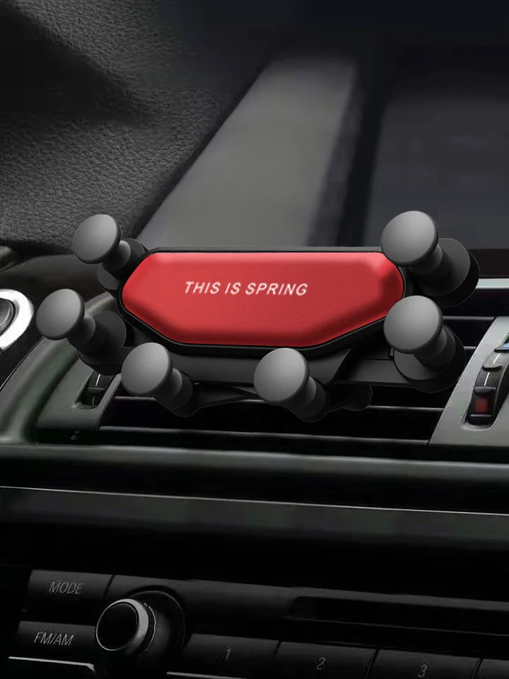A car gravity mobile phone bracket new car air outlet bracket car gift fixed mobile phone bracket manufacturer