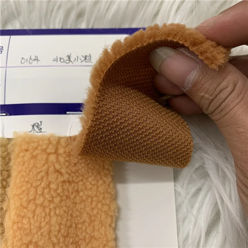 Free sample Hot sale 100% polyester red check jacquard wool rainbow color flannel fleece wholesale fabrics